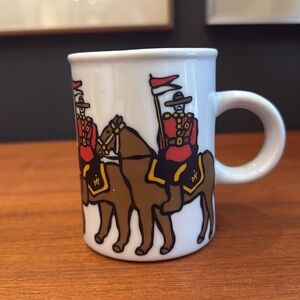 Vintage Marc Tetro mug; Royal Canadian mounted police Northern theme artwork